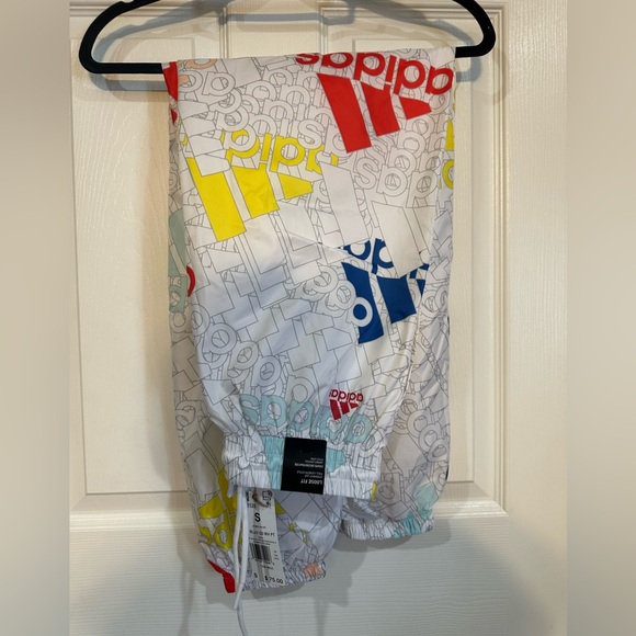 Adidas Women’s Essentials Multi-Colored Logo Woven Pants Small NWT - Picture 2 of 2